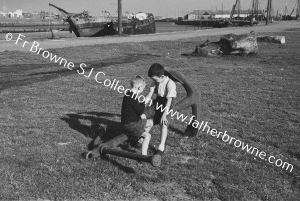 HARBOUR SCENES BOYS WITH ANCHOR